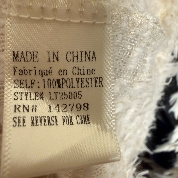 Love Richie Sweater has a shaggy or fuzzy texture and is a cream color. Size M - Picture 9 of 9